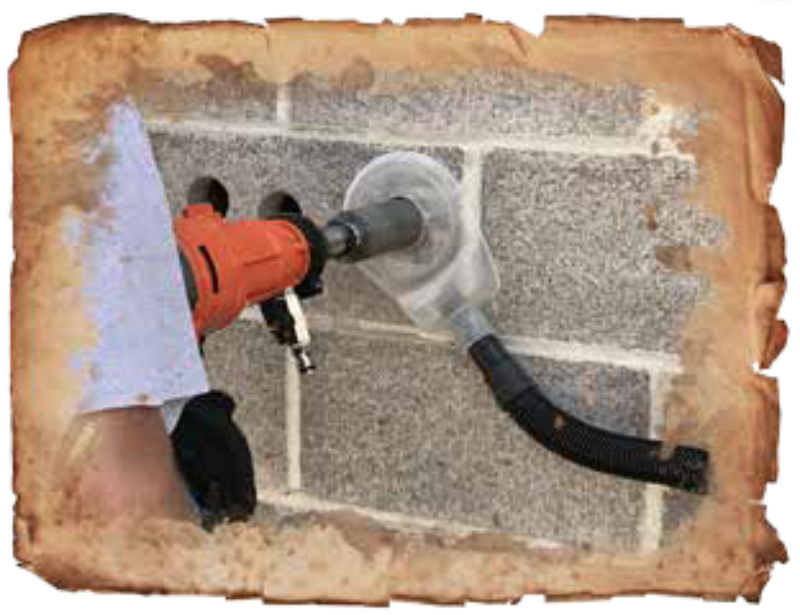 Diamond Products Bit Bandit dust control shroud attached to core drill for dust and slurry containment during concrete drilling